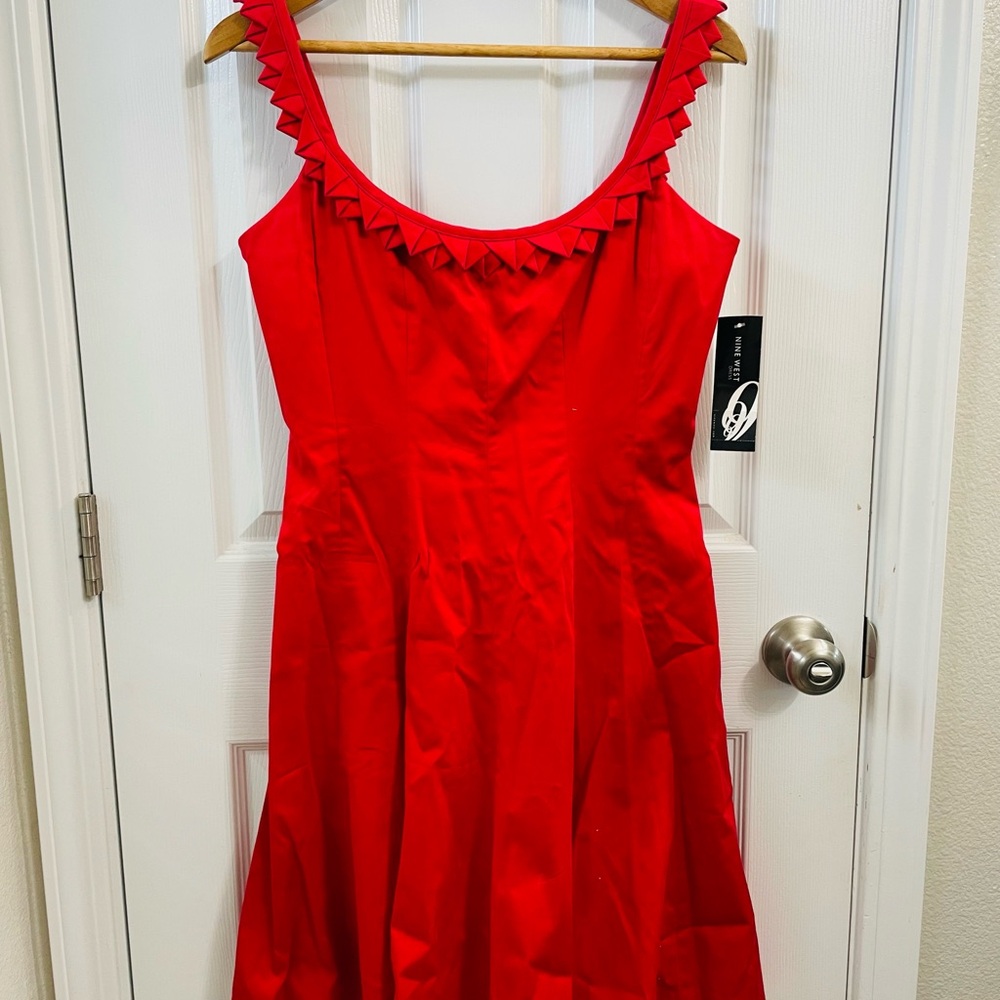 Red Sleeveless Midi Dress with Decorative Neckline